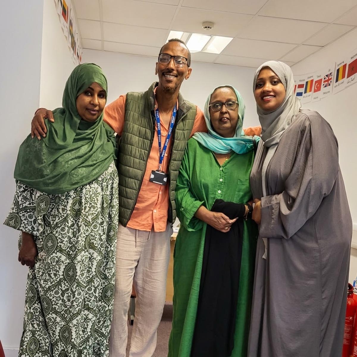 Community advocates smiling together at the Hub