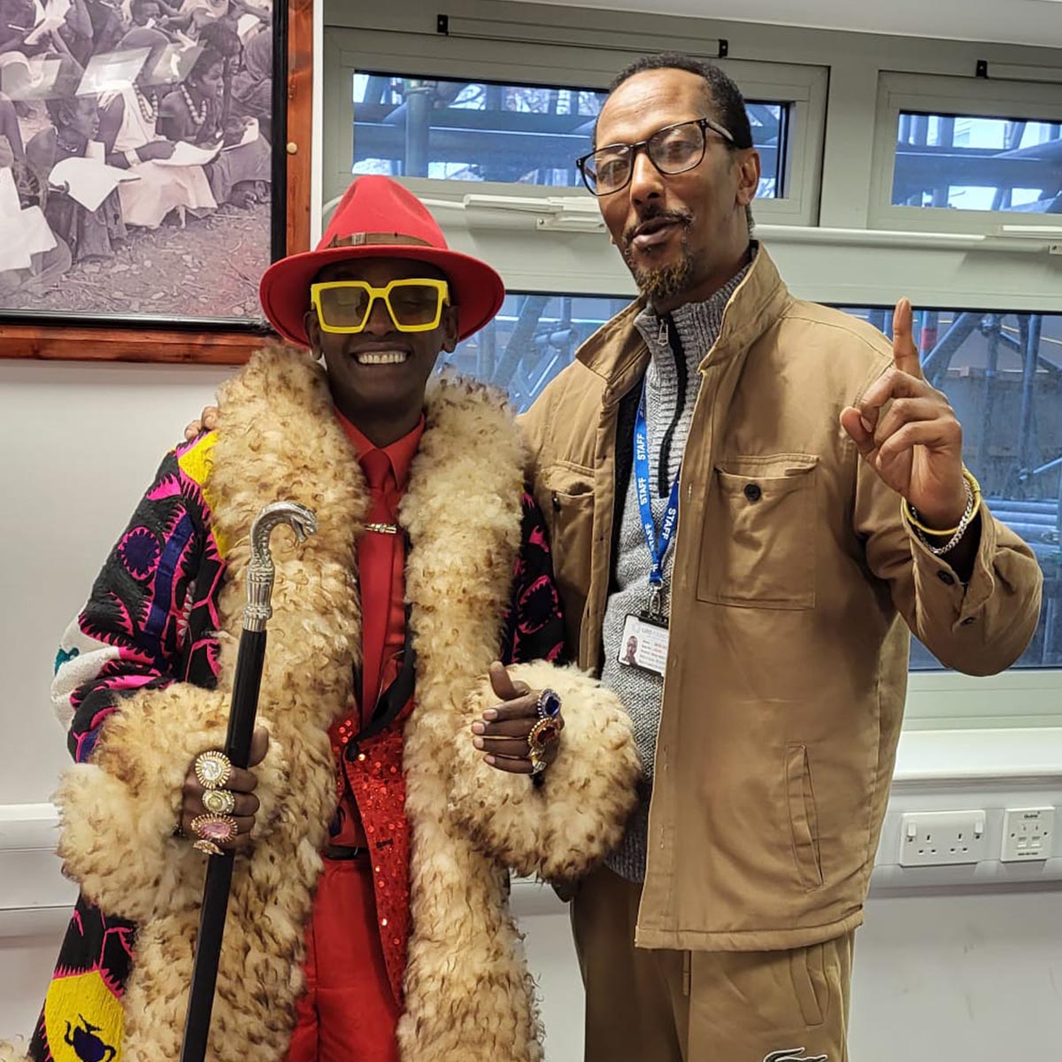Daud and community member celebrating grassroots advocacy